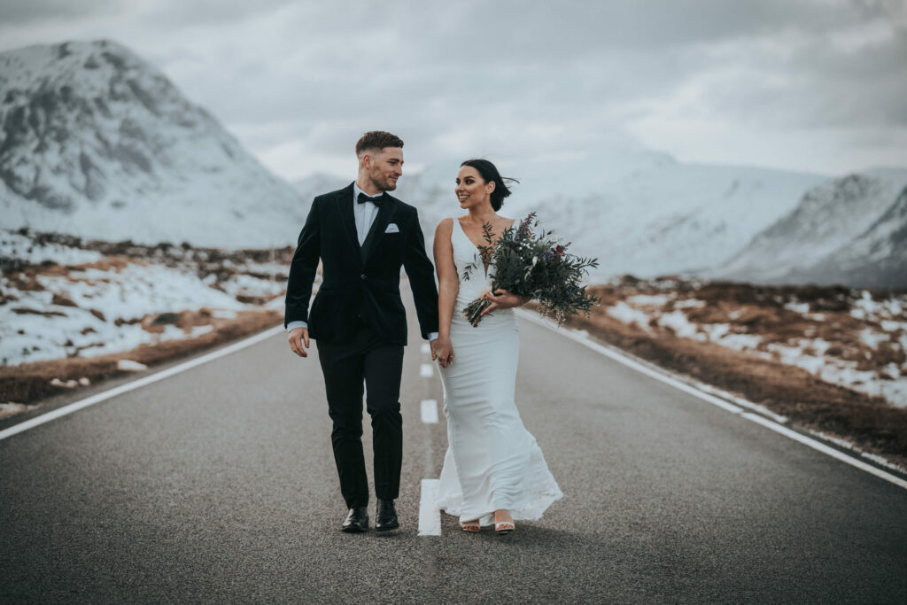 couple on a road eloping in glencoe